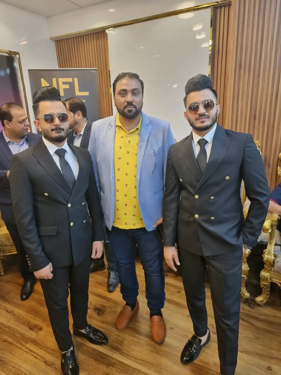 Gulf Media representative meeting industry professionals at a corporate event